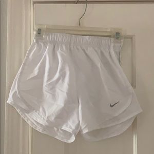 White Nike shorts